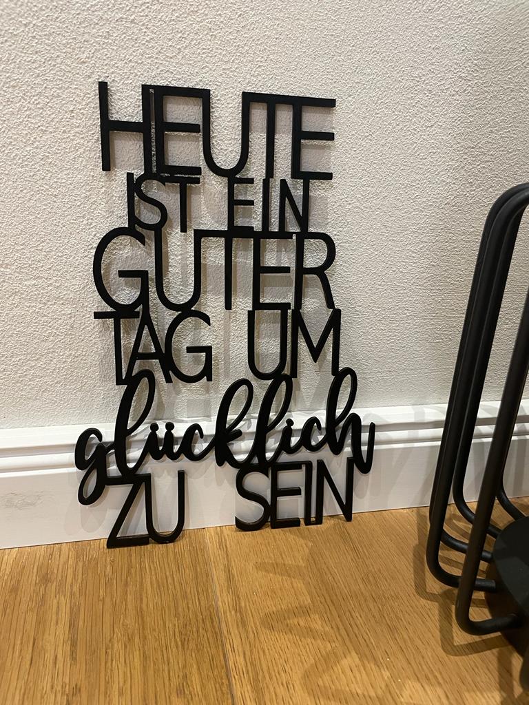 Schriftzug Heute ist ein guter Tag um glücklich zu sein
