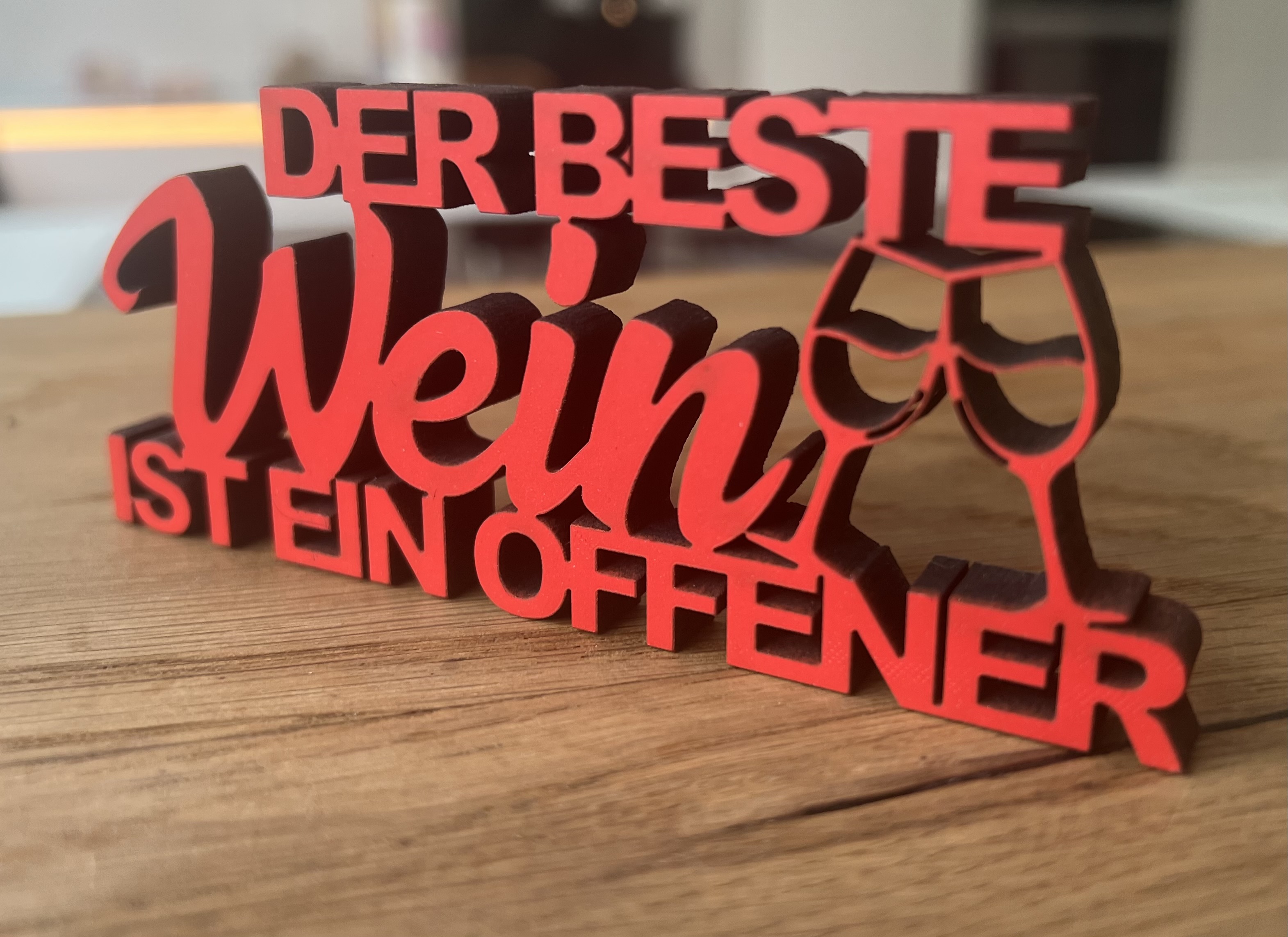 Schriftzug Der beste Wein ist ein offener